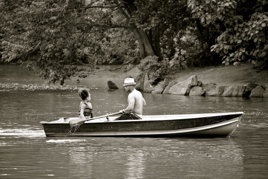father and daughter on boat